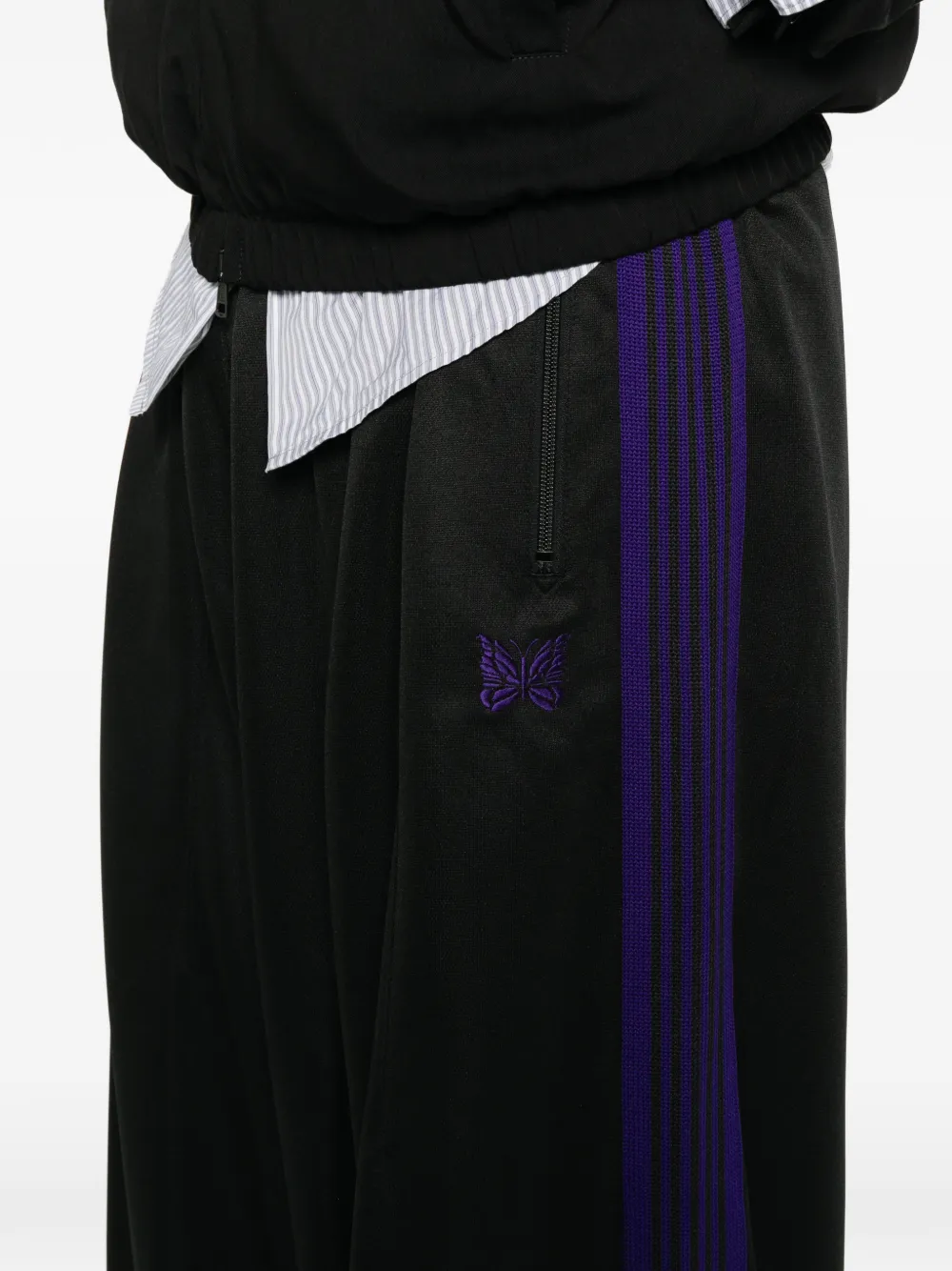 Needles side-stripe logo-embroidered track pants Zwart