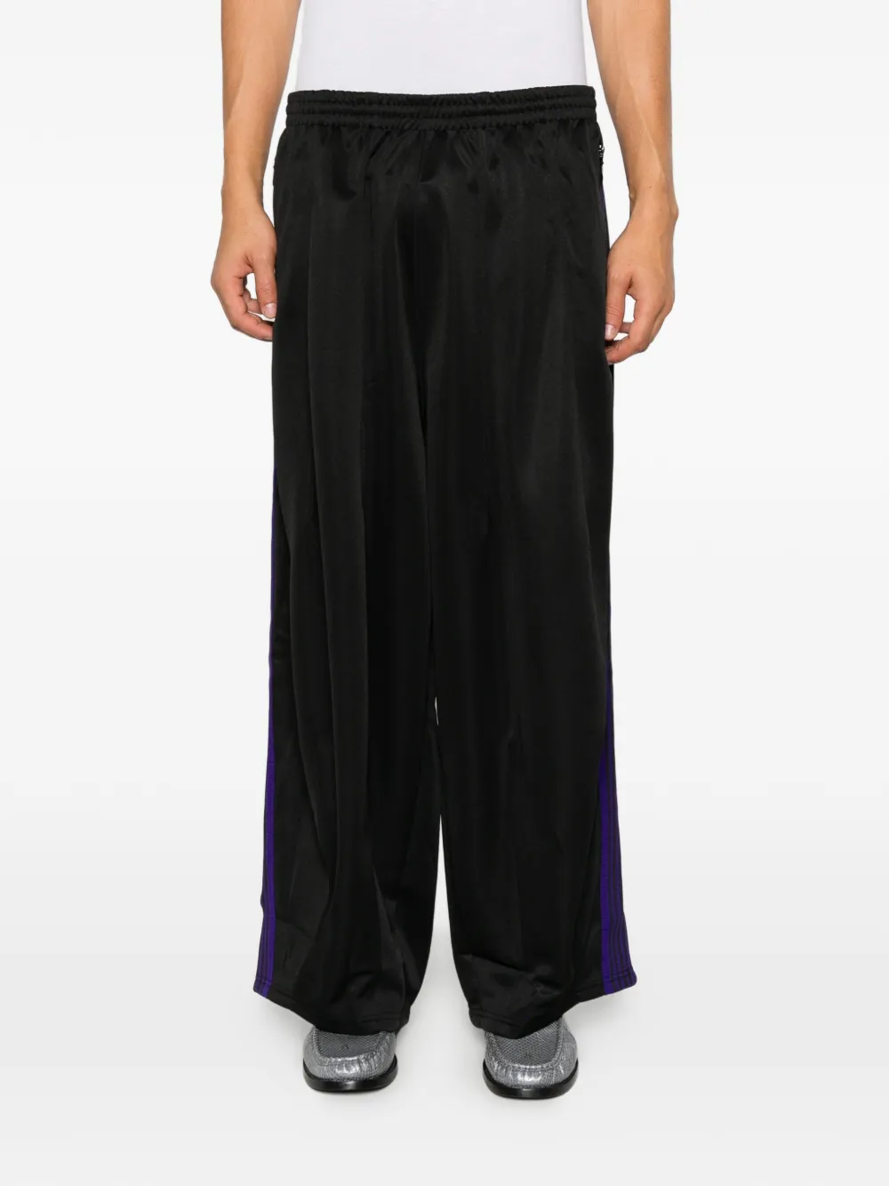 Needles side-stripe logo-embroidered track pants Zwart