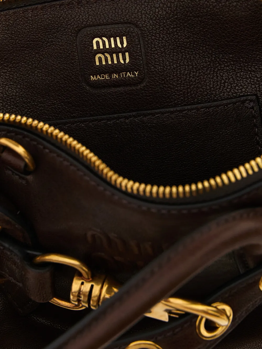 Miu Aventure mini nappa leather bag Bruin