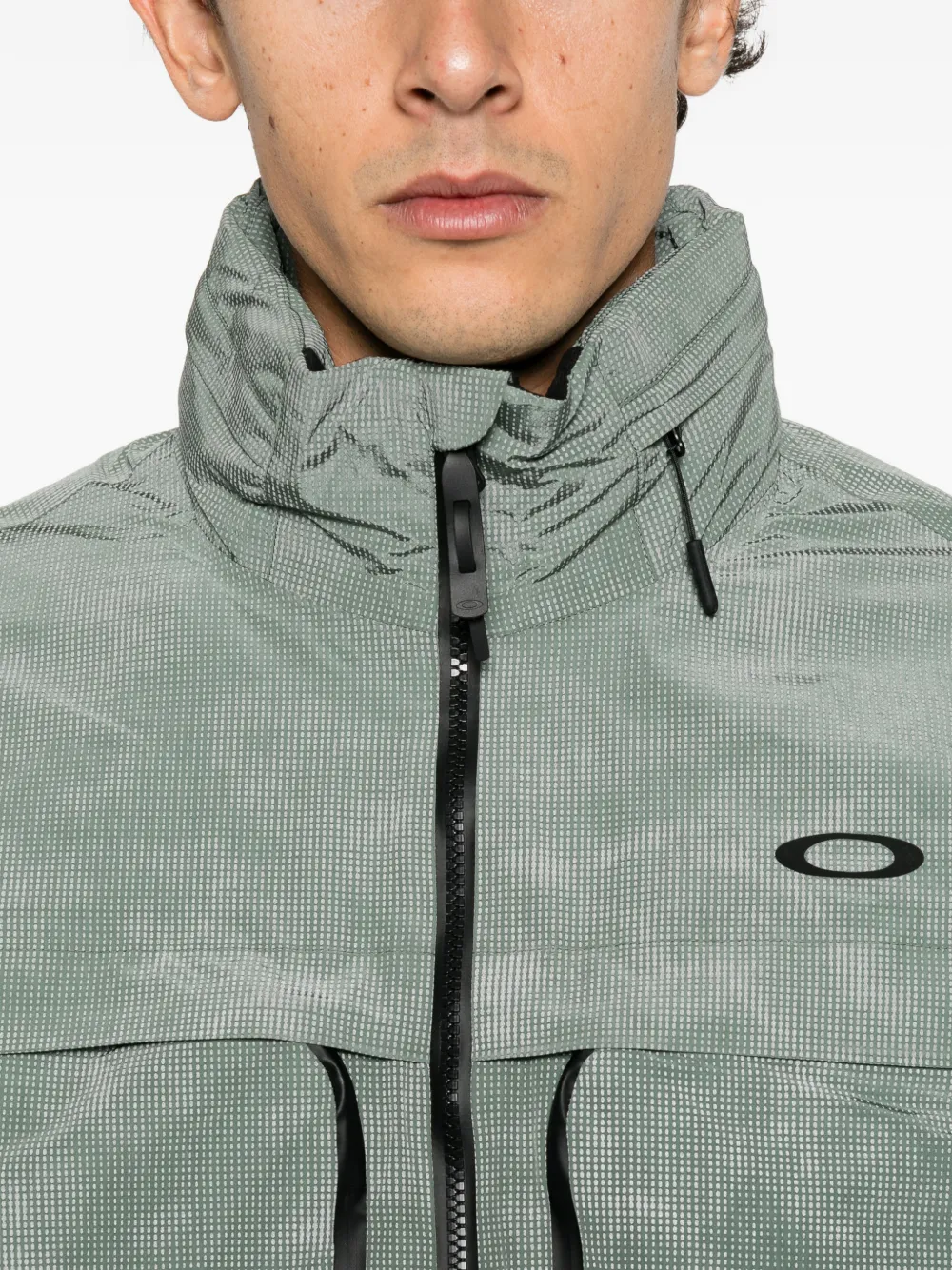 Oakley reflective camo shell windbreaker Groen
