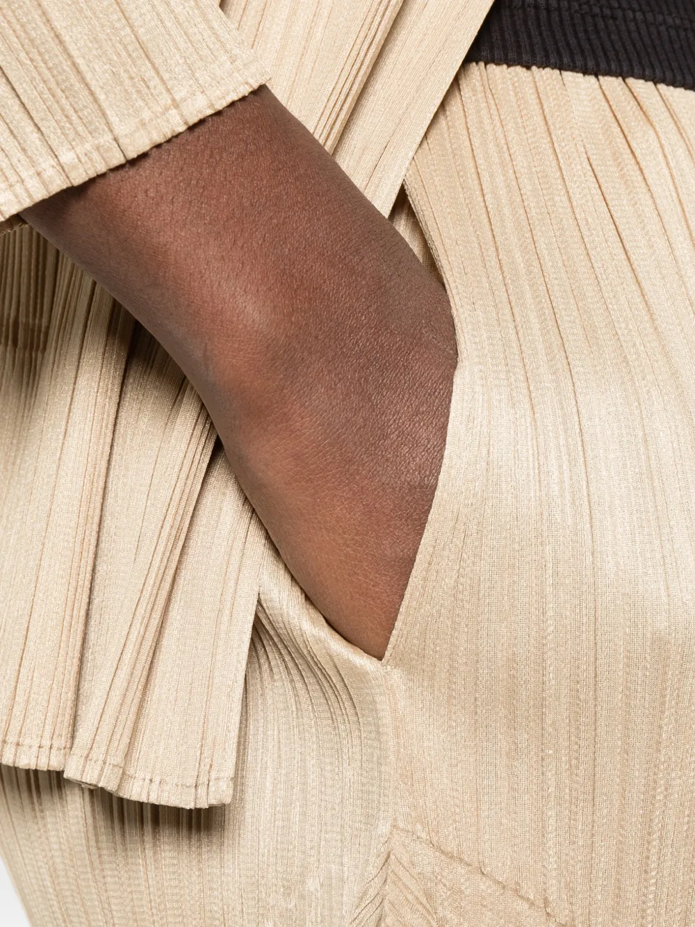 Pleats Please Issey Miyake pleated handkerchief-hem trousers Beige