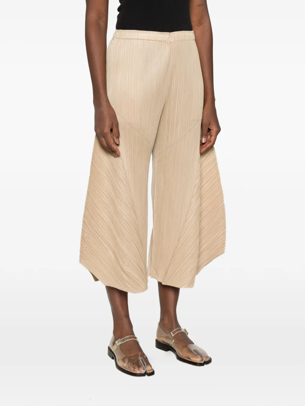 Pleats Please Issey Miyake pleated handkerchief-hem trousers Beige