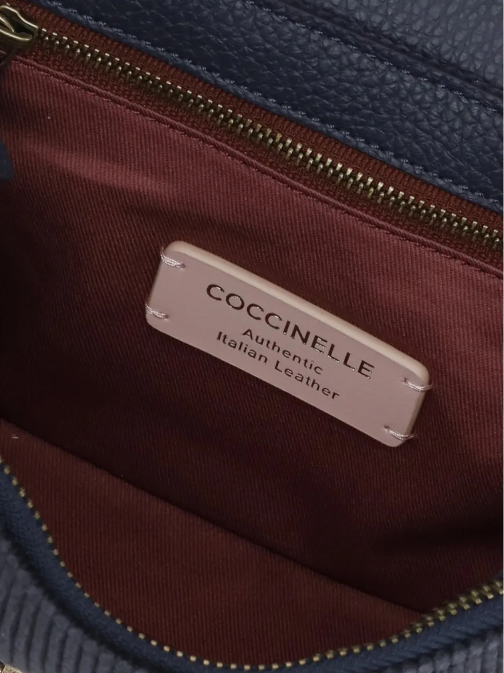 Coccinelle corduroy-effect leather shoulder bag Blauw