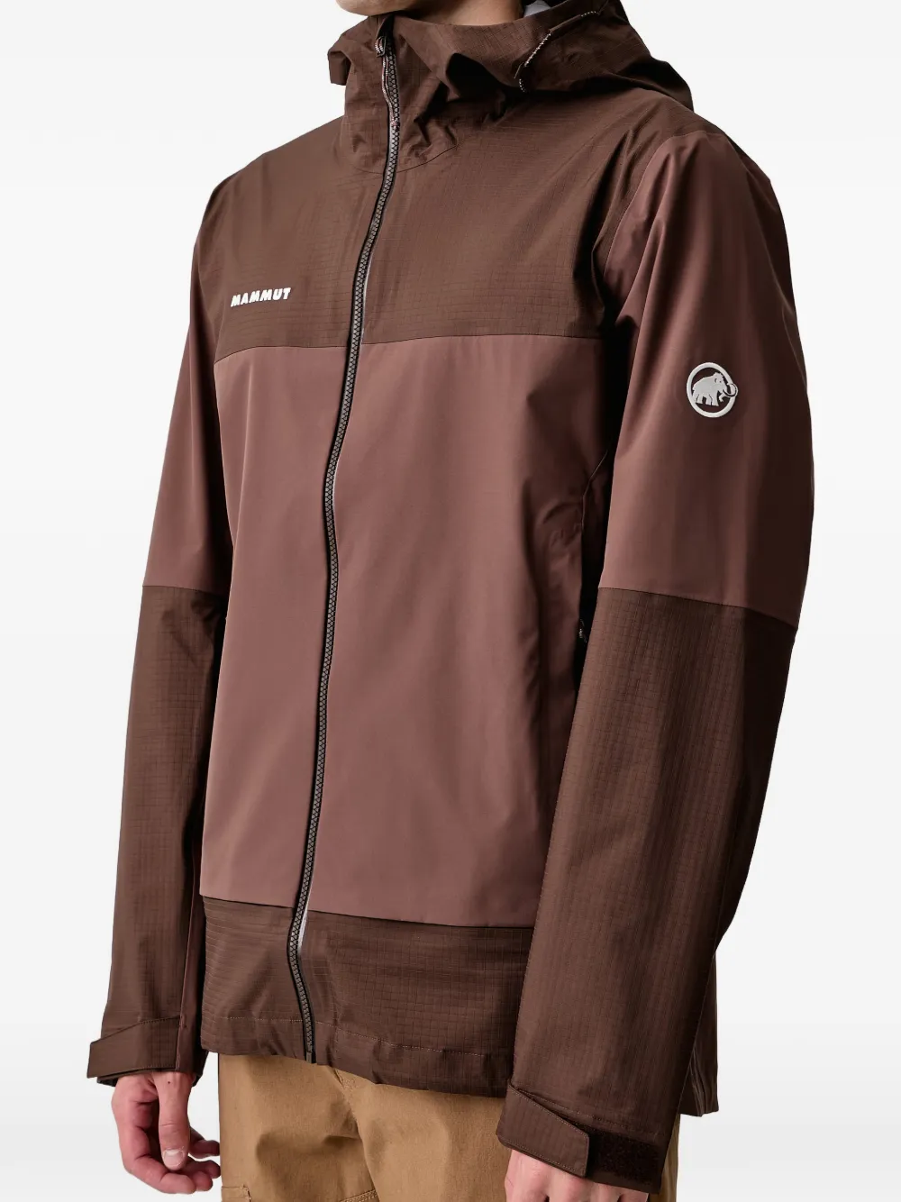 Mammut Ducan jack met capuchon en vlakken Bruin