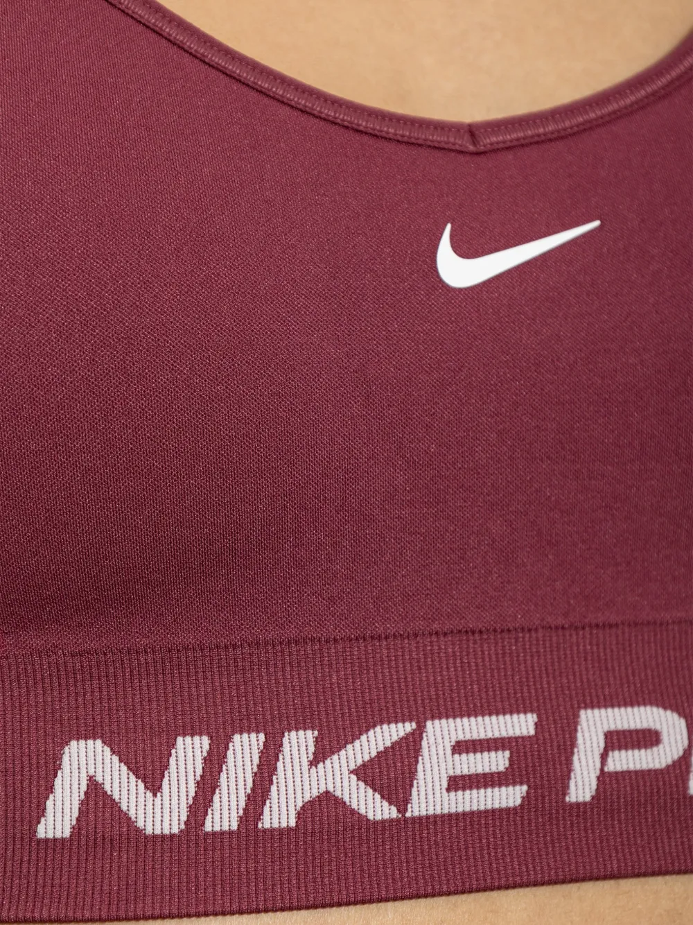Nike Pro seamless light-support padded sports bra Rood