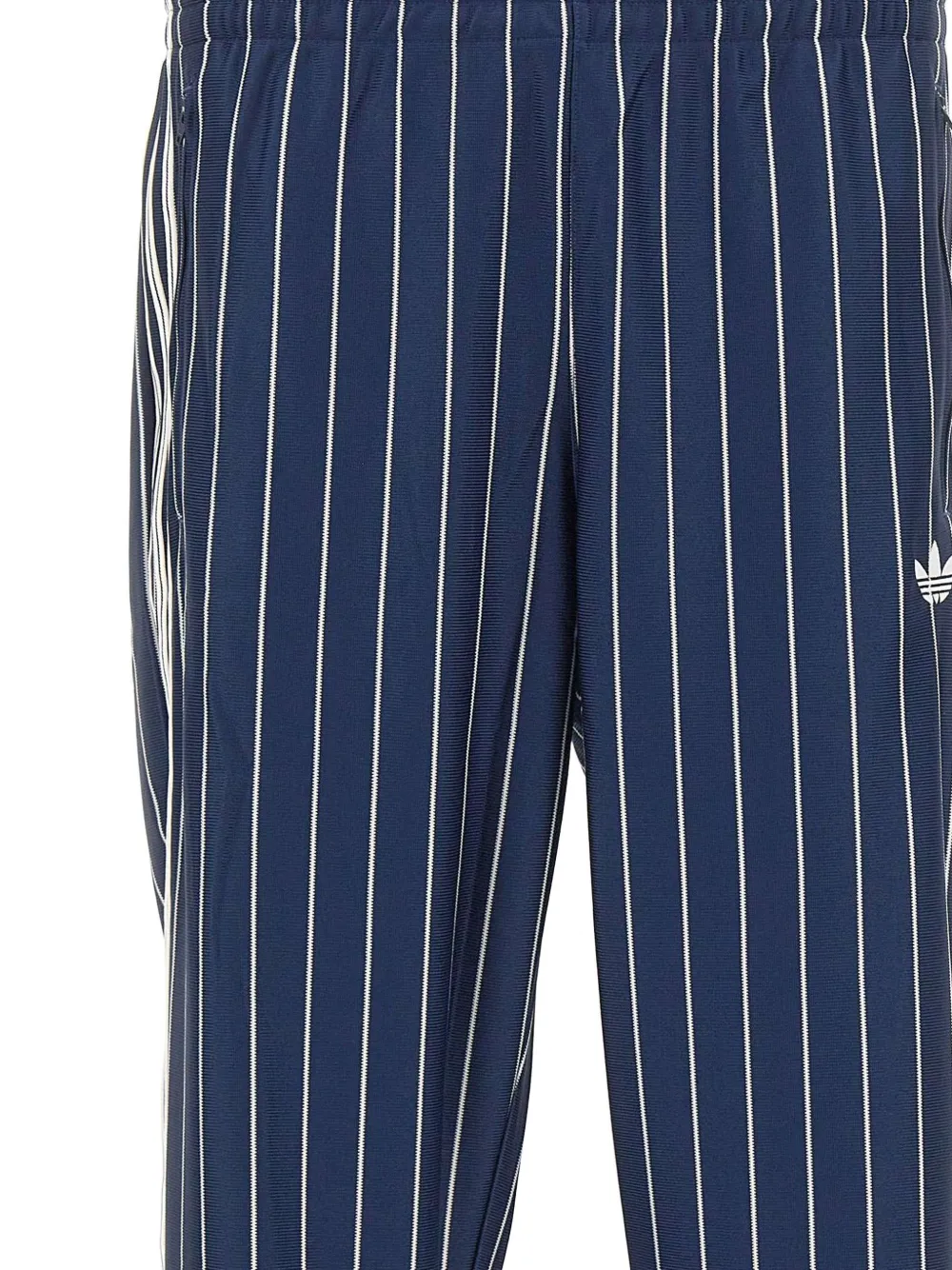 adidas Firebird pinstriped track pants Blauw