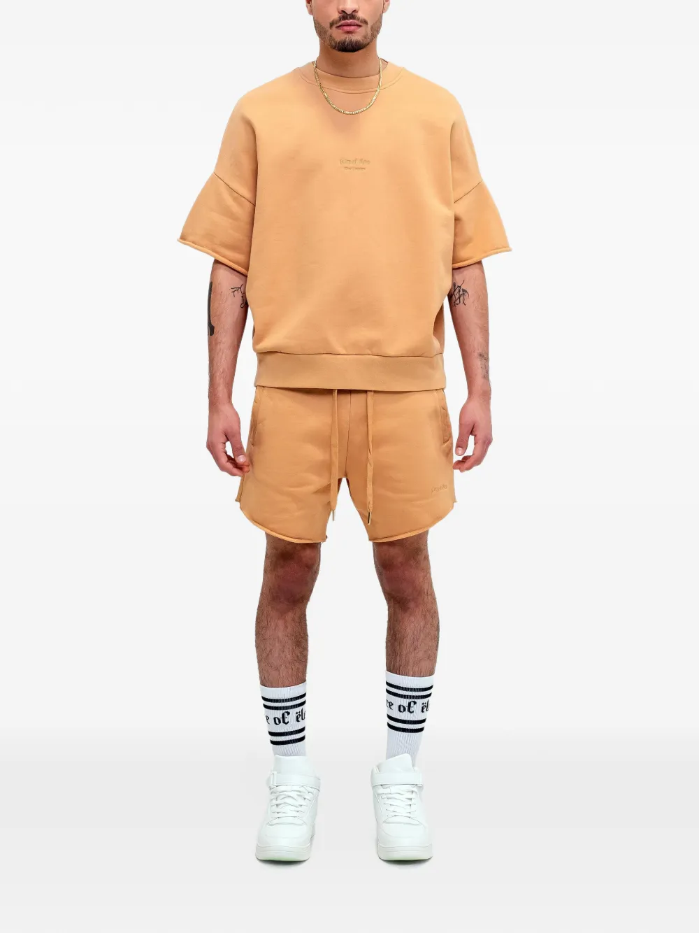 PLACE OF ËLMS logo-embroidered raw-edge sweater Oranje