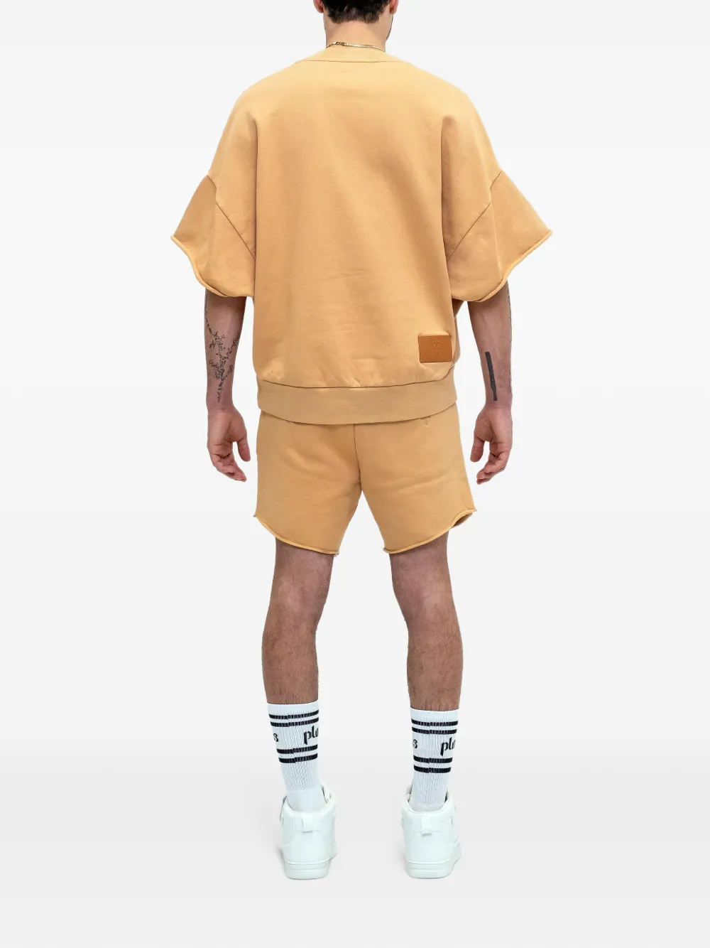 PLACE OF ËLMS logo-embroidered raw-edge sweater Oranje