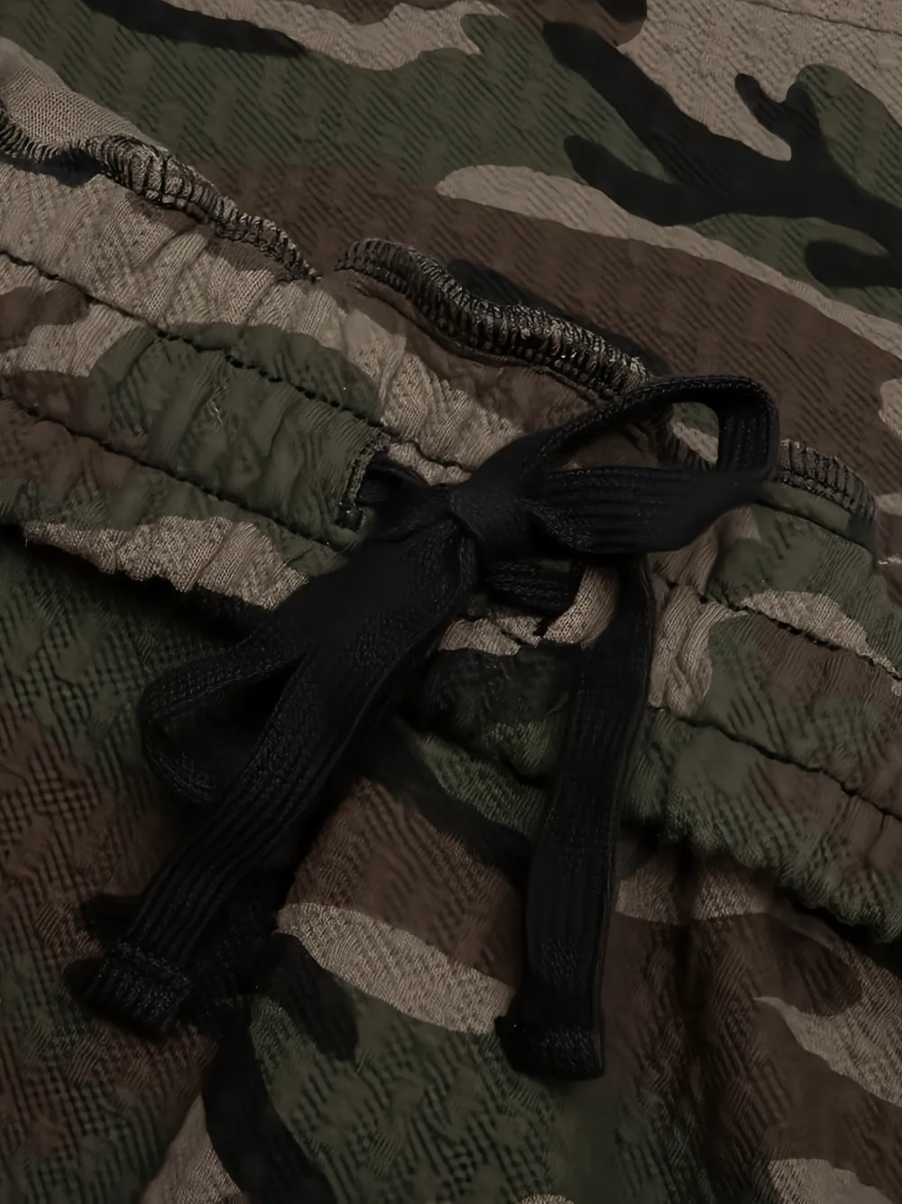 Pleasures camo-print textured track pants Groen