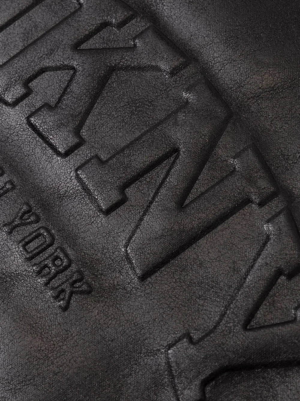 DKNY logo-embossed tote bag Zwart