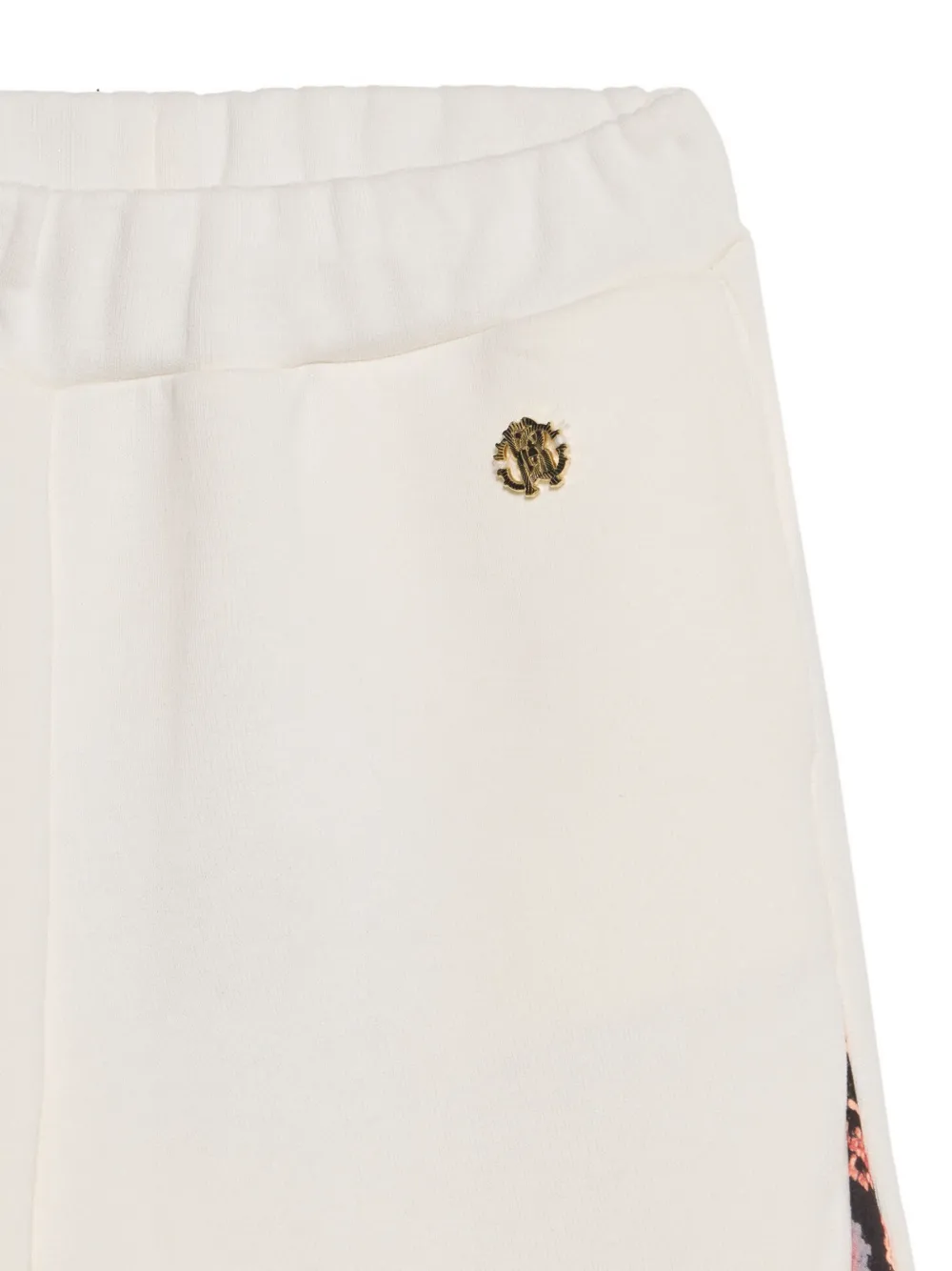 Roberto Cavalli Junior snakeskin-print flared trousers Beige