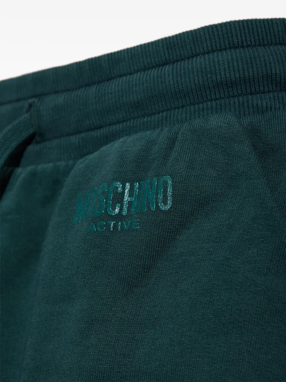 Moschino logo-tape track shorts Groen