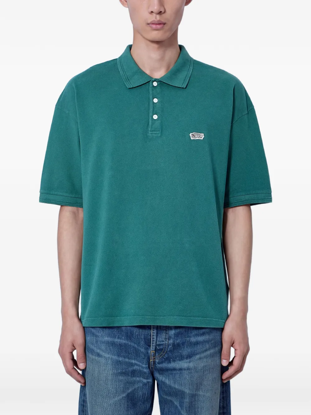 Visvim embroidered-logo-patch polo shirt Groen