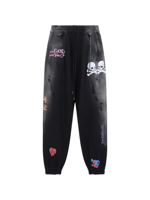 Mastermind World distressed graphic-print track pants