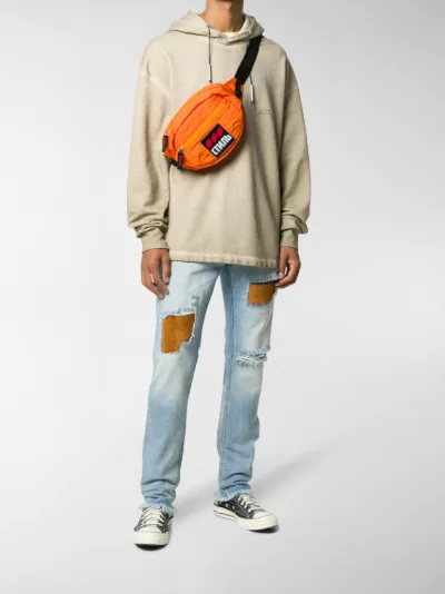 ripped mid rise jeans