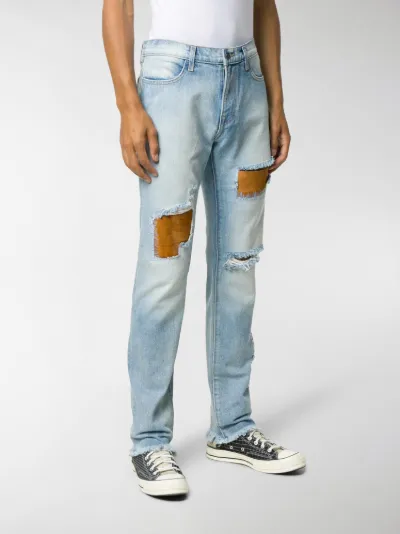 ripped mid rise jeans