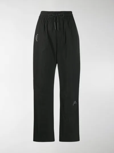 black shell track pants