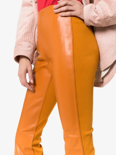 orange leather trousers