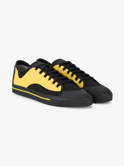 black and yellow adidas trainers