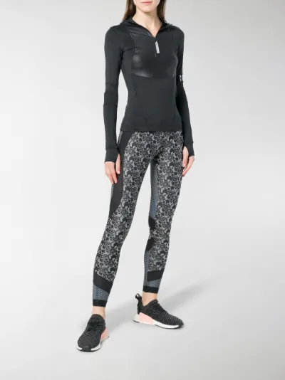 adidas by Stella McCartney Leggings a fiori nero | MODES