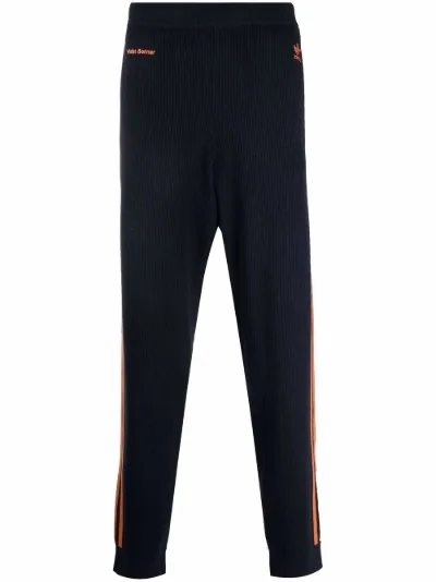 adidas Pantaloni sportivi con banda laterale adidas x Wales Bonner blu |  MODES