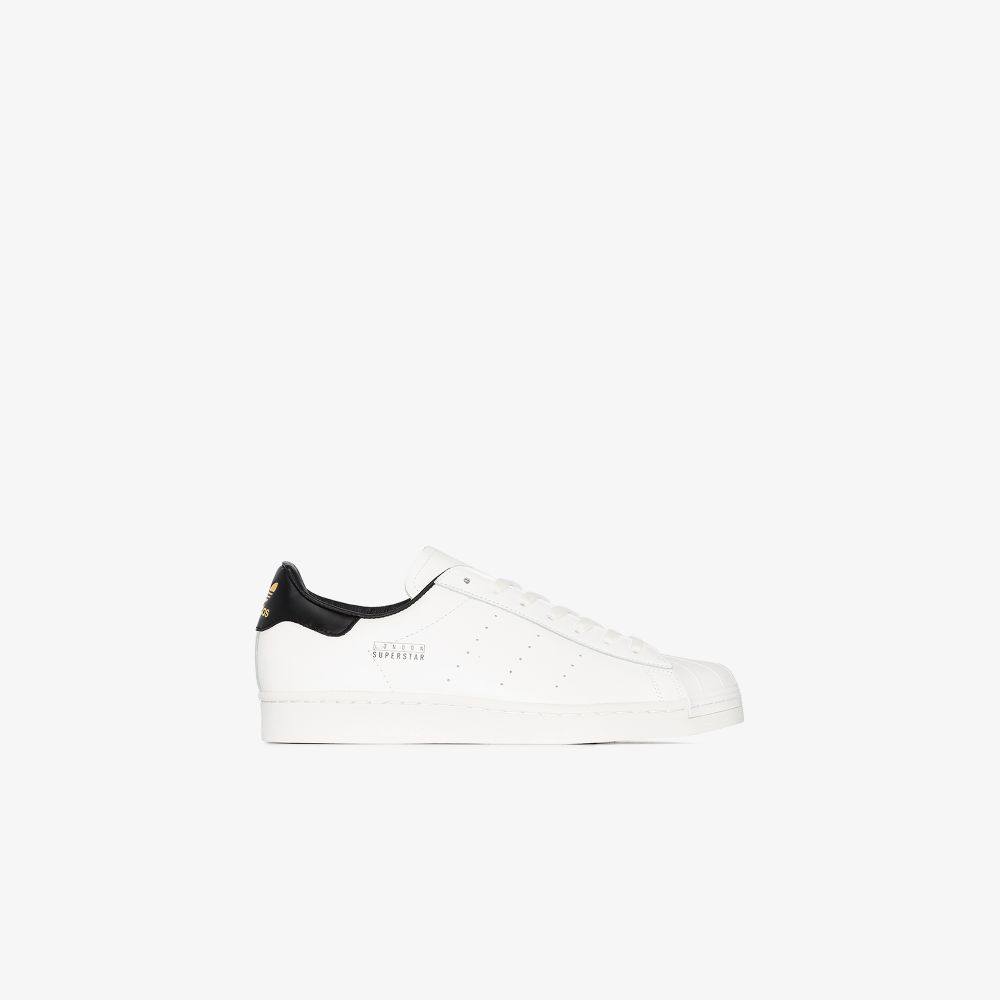 adidas white and black tennis shoes