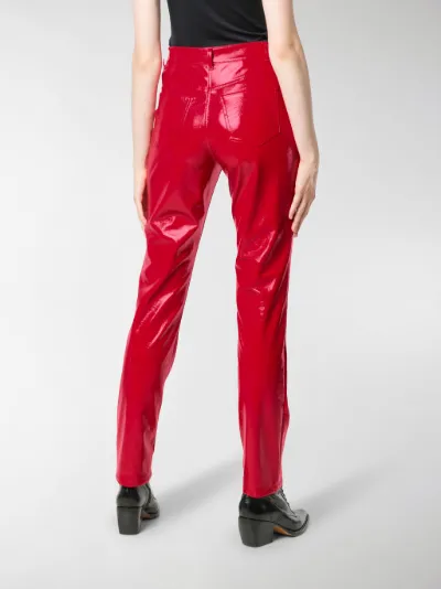 red faux leather trousers