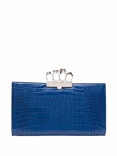 embossed leather clutch