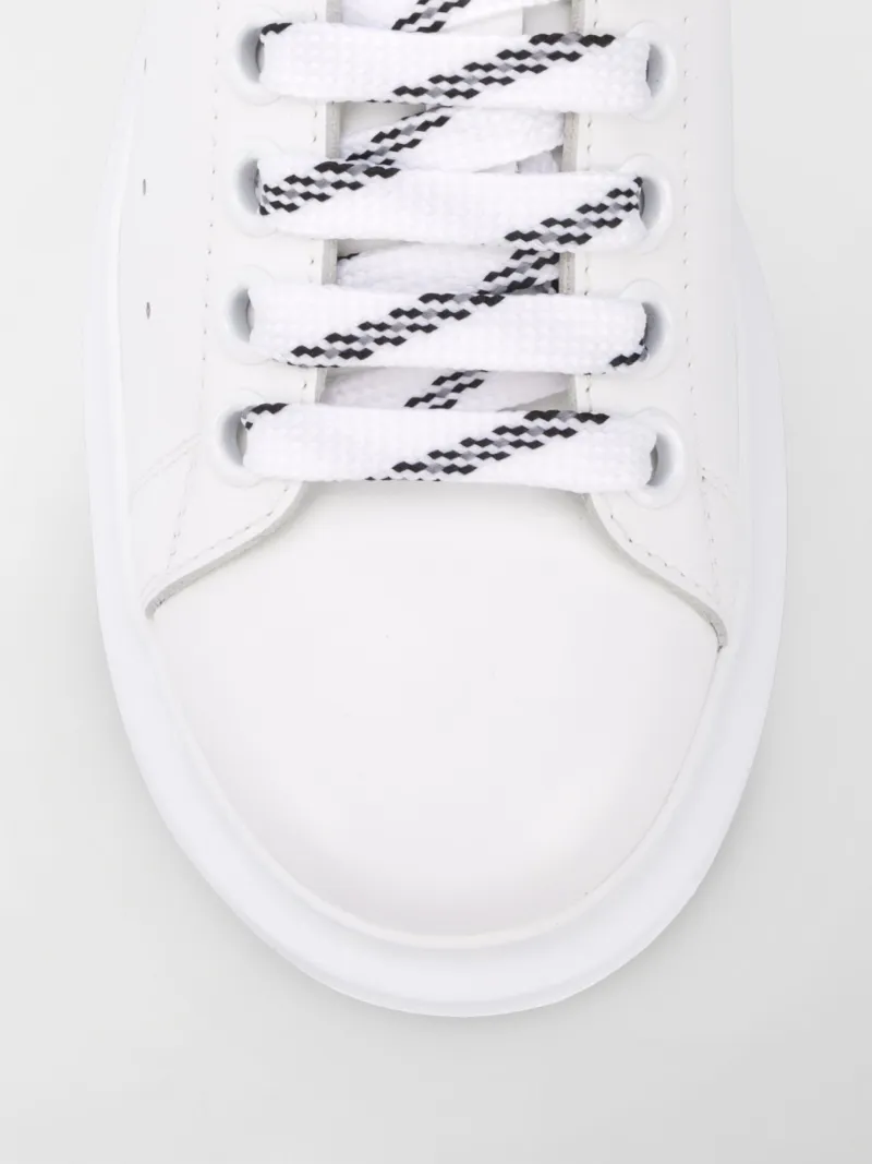 Alexander McQueen oversized leather sneakers white | MODES