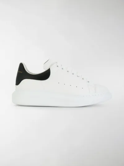 ALEXANDER MCQUEEN di colore bianco Sneakers oversize| MODES.com ALEXANDER MCQUEEN di colore bianco Sneakers oversize| MODES.com