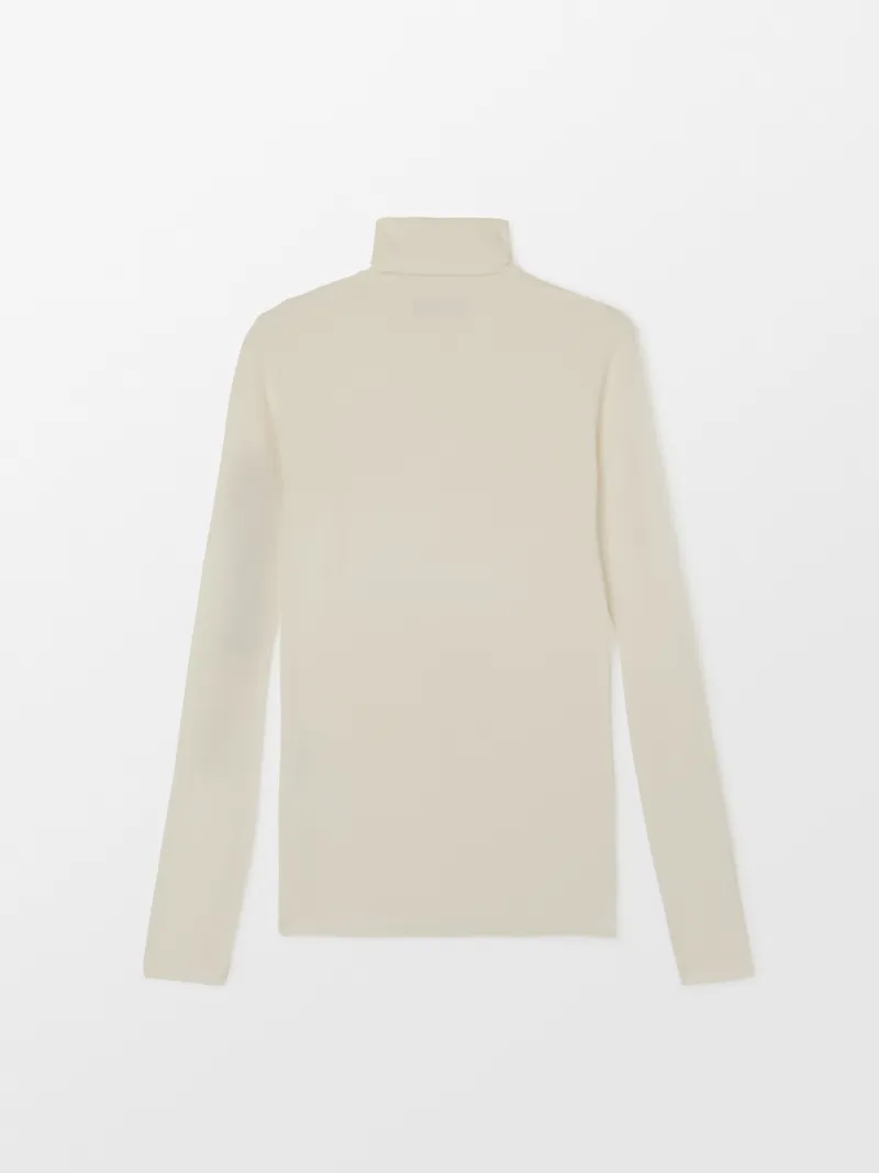 JERSEY WORKSHOP TURTLENECK