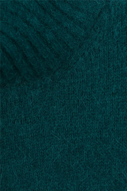 green oversized turtleneck sweater