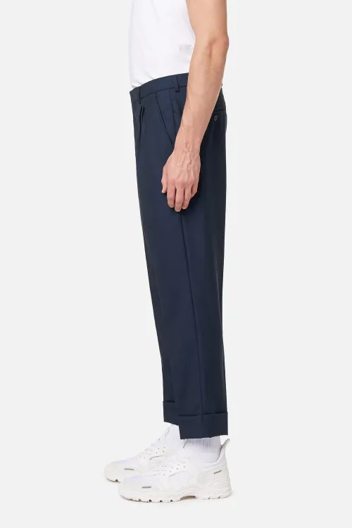 pleated carrot fit trousers