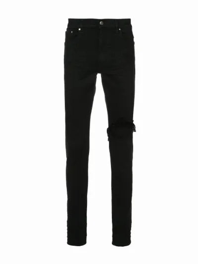 Broken jeans | AMIRI | Eraldo.com