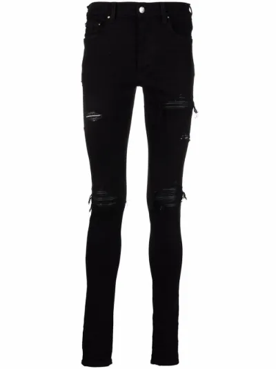distressed-finish ripped skinny jeans 