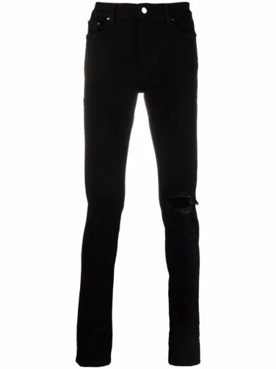 distressed-finish slim-cut jeans 