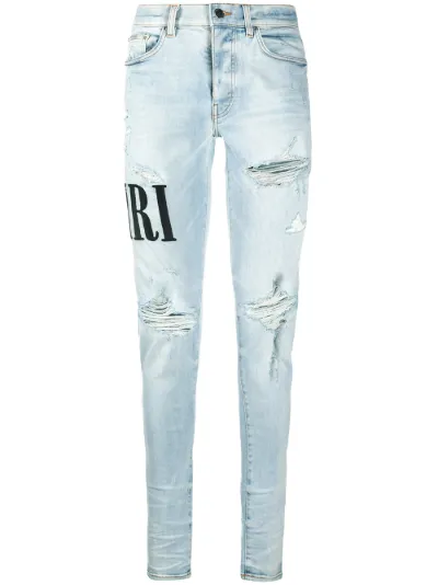 amiri distressed skinny jeans