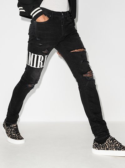 black and green amiri jeans