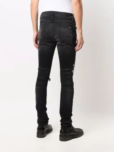 logo-print jeans | AMIRI | Eraldo.com