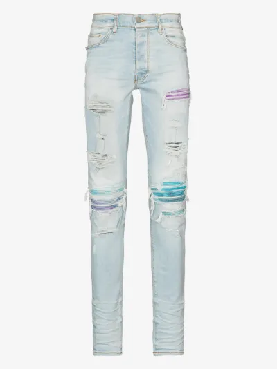 amiri distressed skinny jeans