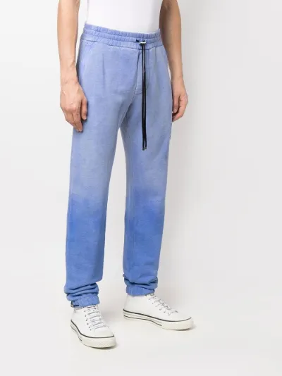 AMIRI Pantaloni sportivi con effetto schiarito blu | MODES