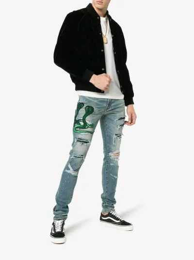 jeans with snake patch