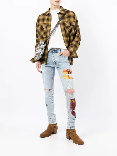 x Playboy magazine print super-skinny jeans | AMIRI | Eraldo.com