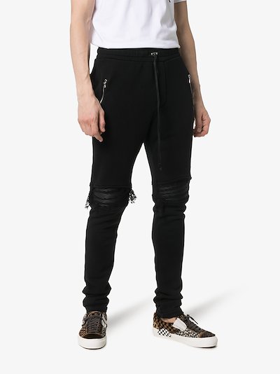 Amiri Zip pocket distressed detail cotton track pants | Browns