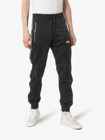 amiri track pants
