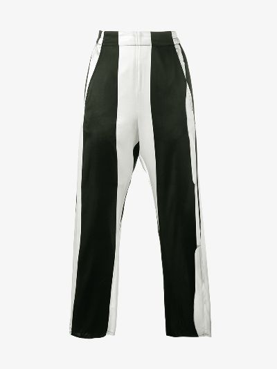 black trousers with silver stripe