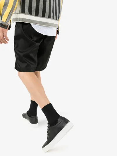 axel arigato platform sneaker black
