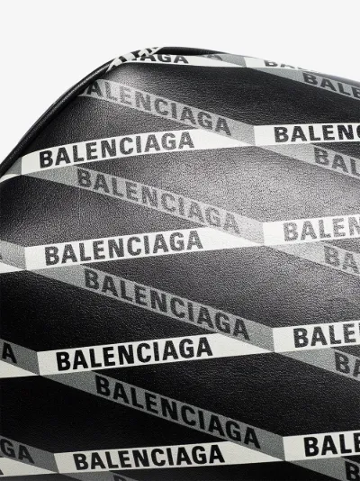 black balenciaga bag with white writing