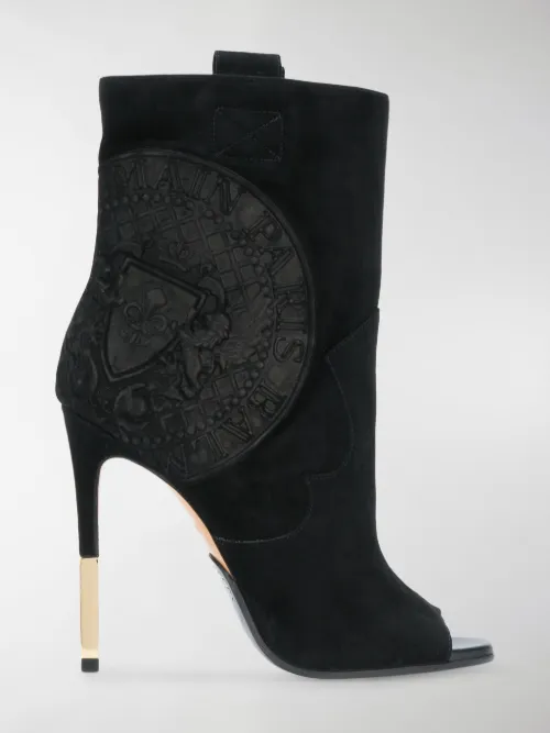 Balmain - medallion-embossed ankle boots