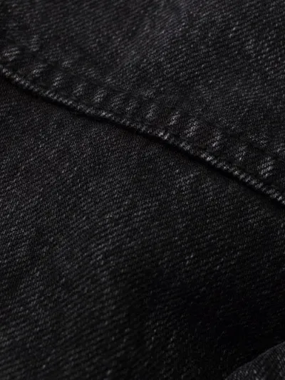 black denim jacket ripped